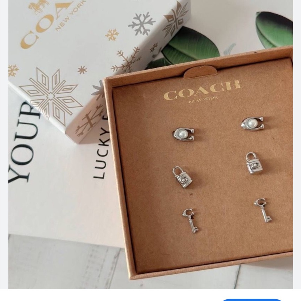 NWOT Coach Silver and White Lock and Key Earrings